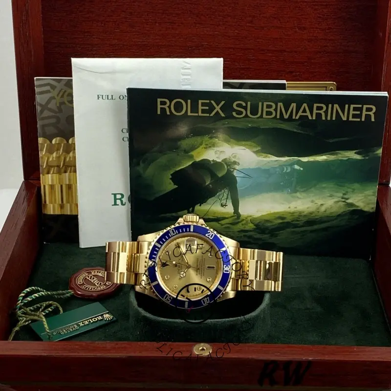 Rolex Submariner 16618, champagne dial and blue bezel, full set with box, crown visible at 3 o’clock.