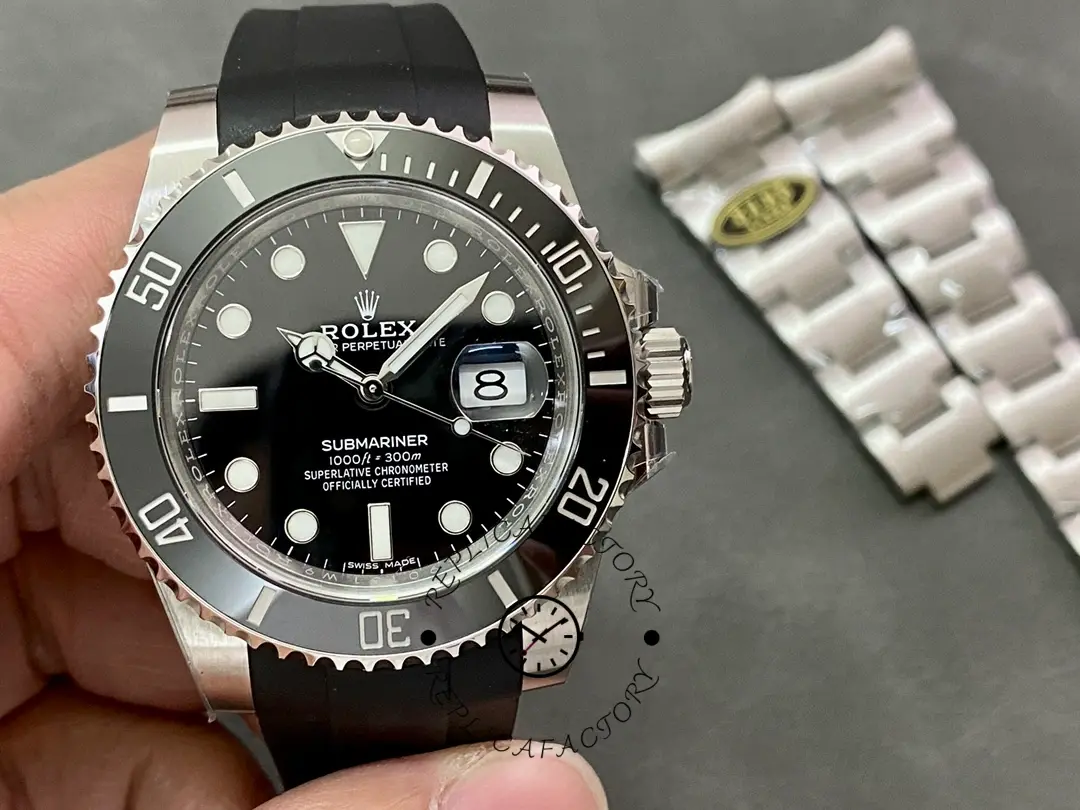 Rolex Submariner 126610LN, cushion display with spare links beside the watch.