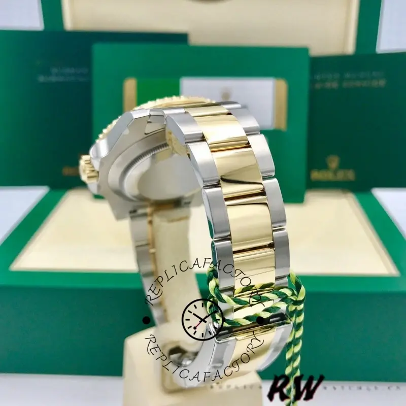 Bracelet view of Rolex Submariner Date 16613 showing Oyster links, clasp area, and two-tone finish.