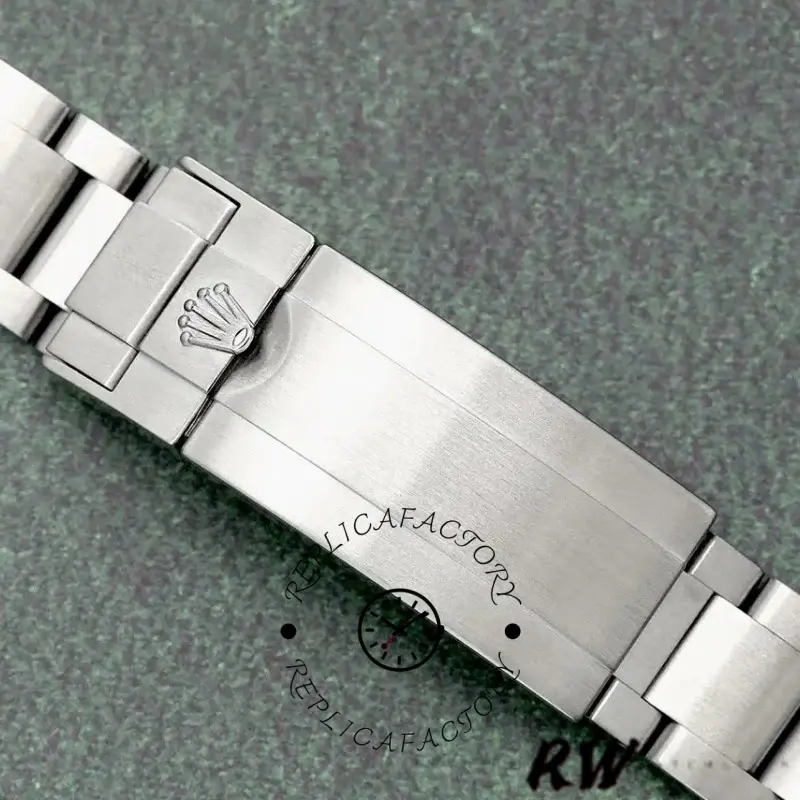 Rolex Submariner Date 116610LN clasp close-up, folding buckle with engraved Rolex crown on bracelet.