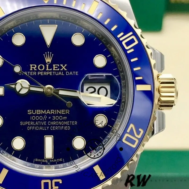Close-up of Rolex Submariner Date 16613 blue dial, cyclops date window, and bezel markers.