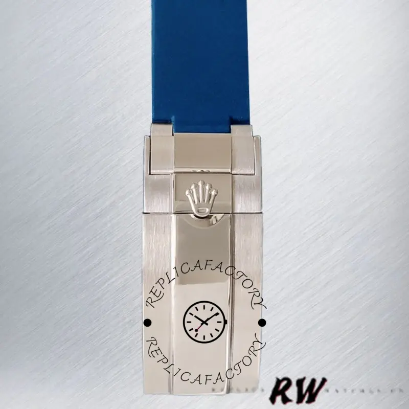 Rolex Submariner 116610, clasp detail on blue rubber strap, side view.