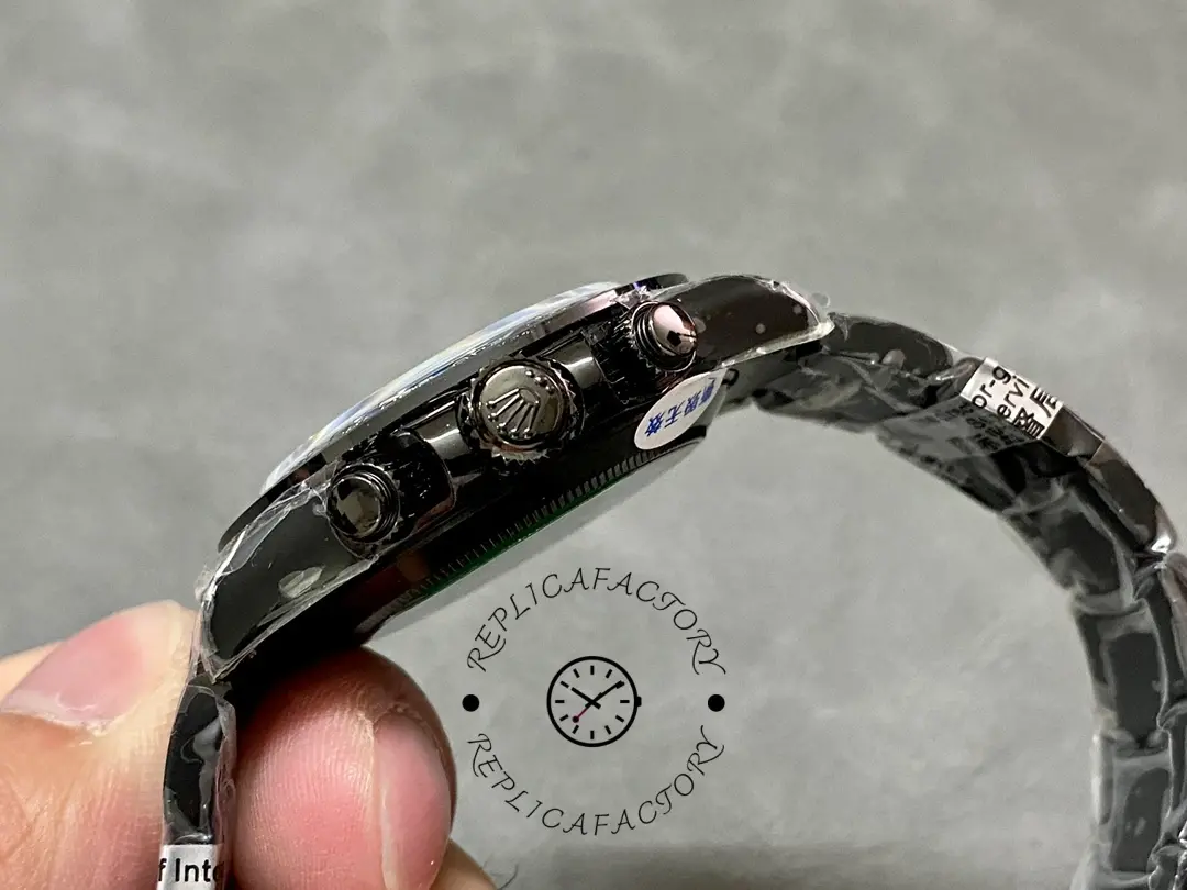 Side profile of the Rolex Daytona Blaken PVD 40MM, showing underside bracelet, crown and lug area.