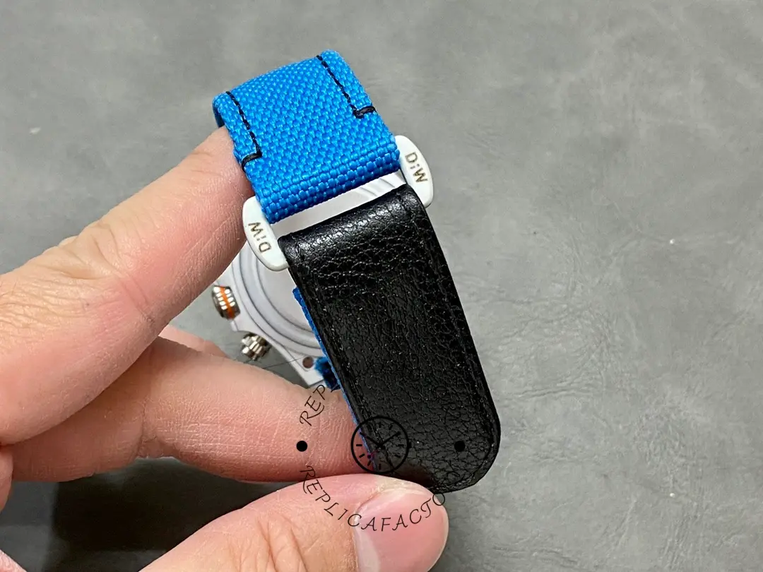 Rolex Daytona 116500LN, strap and clasp detail showing blue nylon band and buckle hardware.