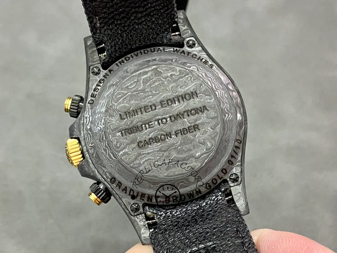 Rolex Daytona DIW 40mm, caseback view with engraved back and crown side visible.