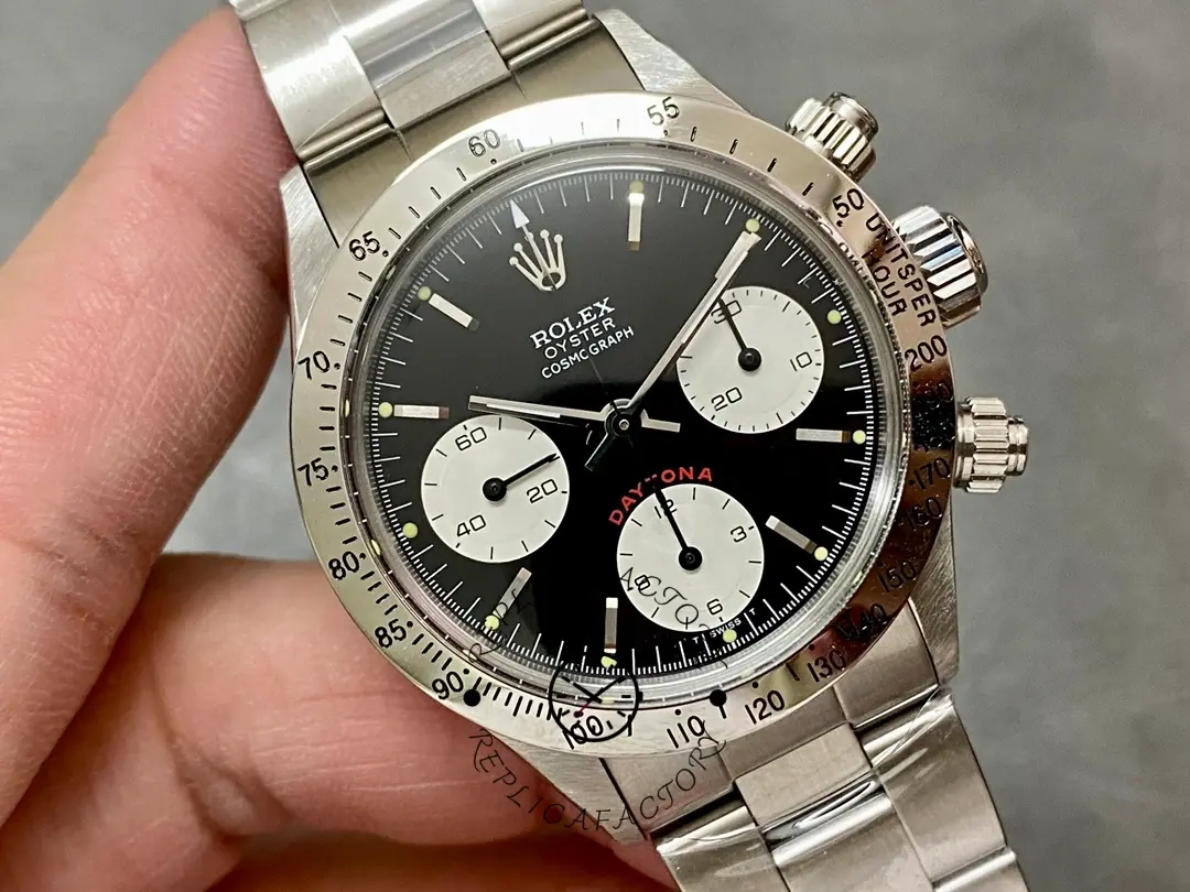 Rolex Daytona 6265, angled front view highlighting tachymeter bezel and black dial subdials.