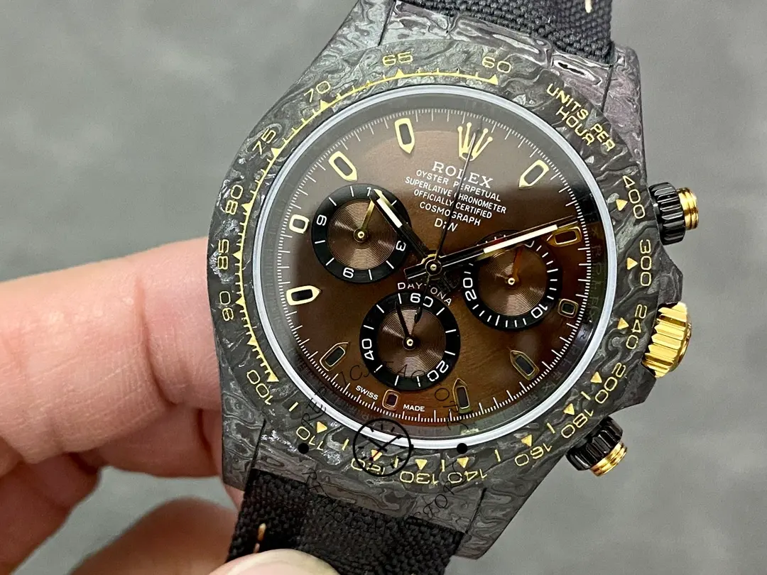 Rolex Daytona DIW 40mm, angled front view highlighting bezel edge and case profile.