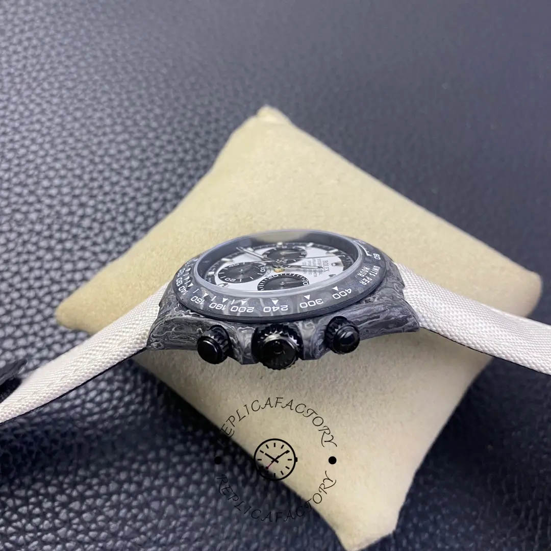 Rolex Daytona DIW Carbonfiber 40, side view showing crown and chronograph pushers.