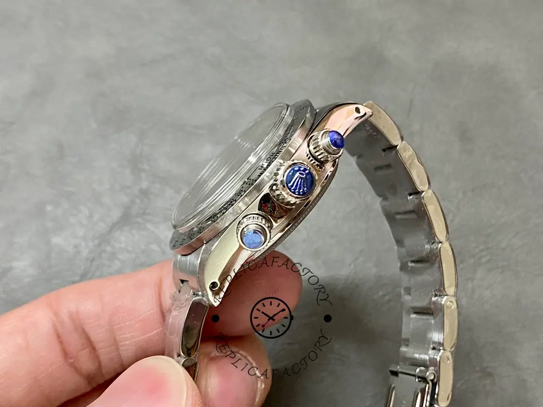 Rolex Daytona 6265, side profile showing the crown and chronograph pushers on the case.