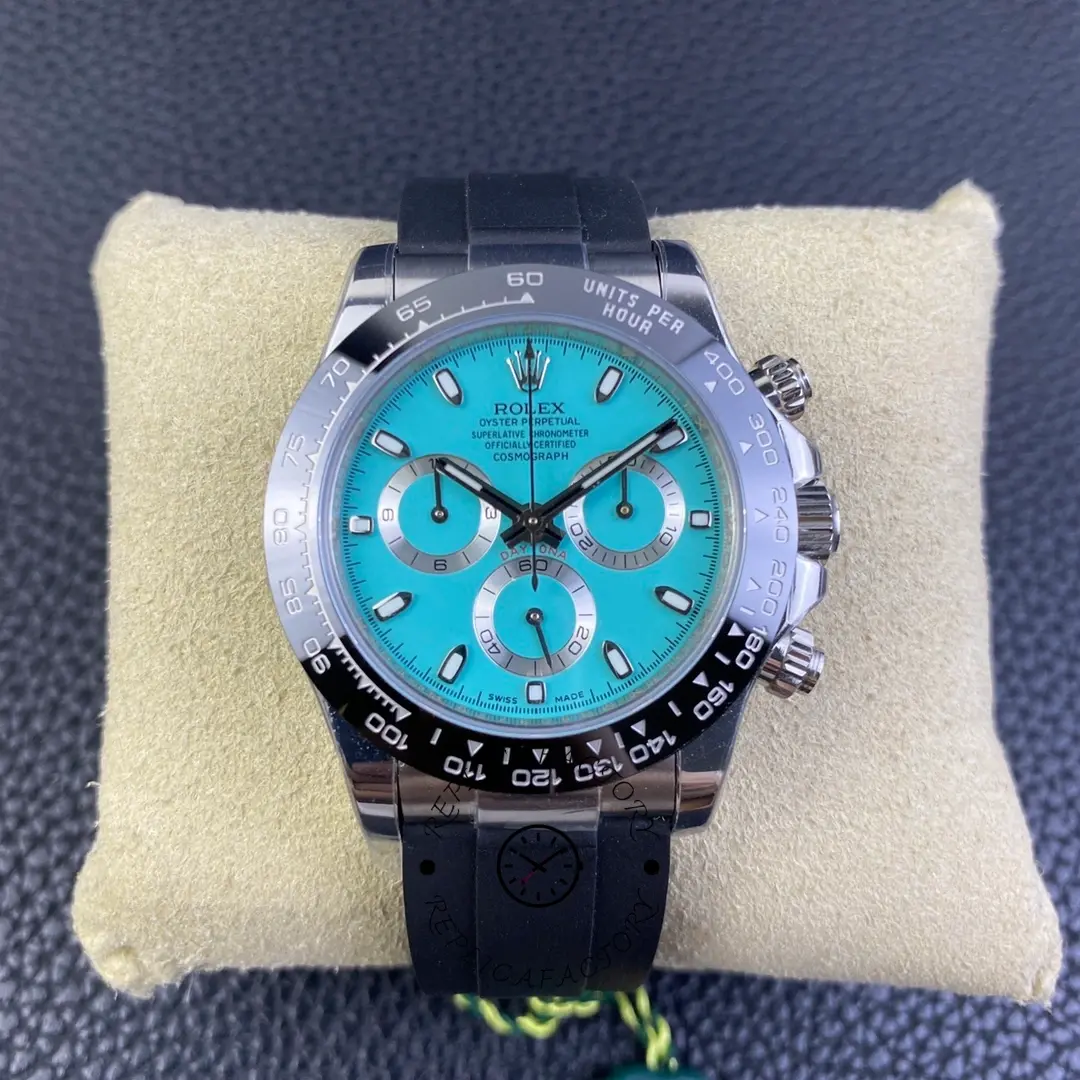 Front view of Rolex Daytona 116519LN on cushion, ice-blue dial with three subdials visible.