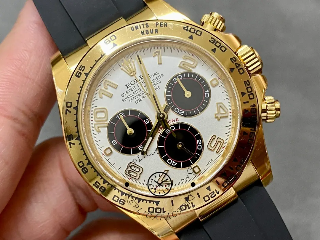 Rolex Daytona 116518, angled front view showing gold bezel, pushers, and silver dial layout.