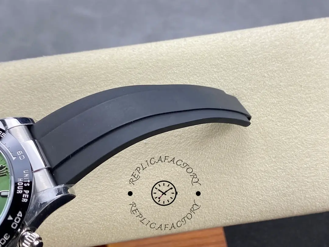 Rolex Daytona 126506, rubber strap curve detail showing underside texture.