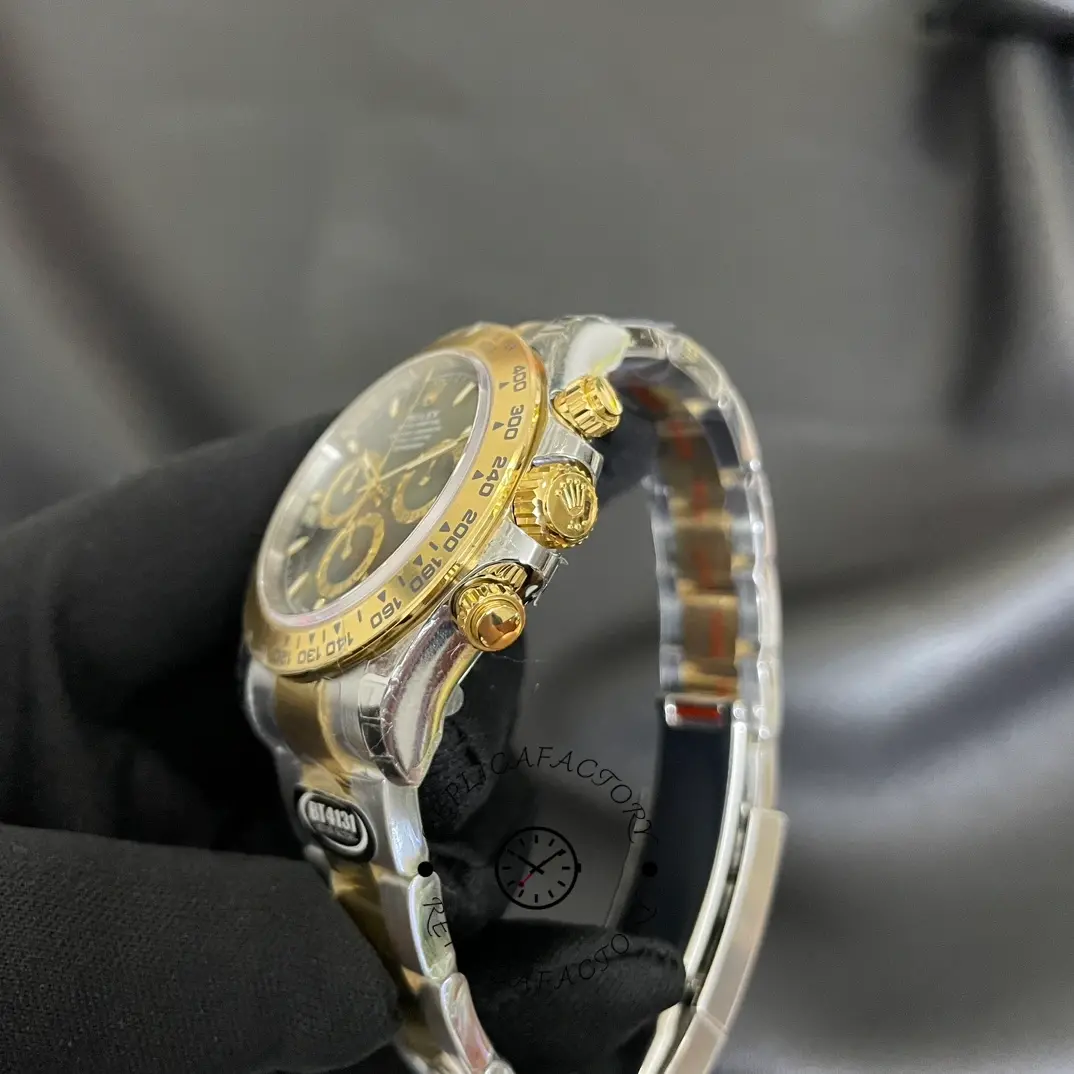 Strap-side close-up of the Rolex Cosmograph Daytona 126503 0003 showing crown.