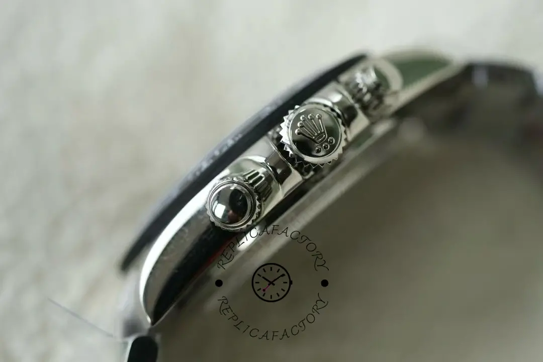 Crown-side view of Rolex Daytona 116520 showing pushers and crown guards.