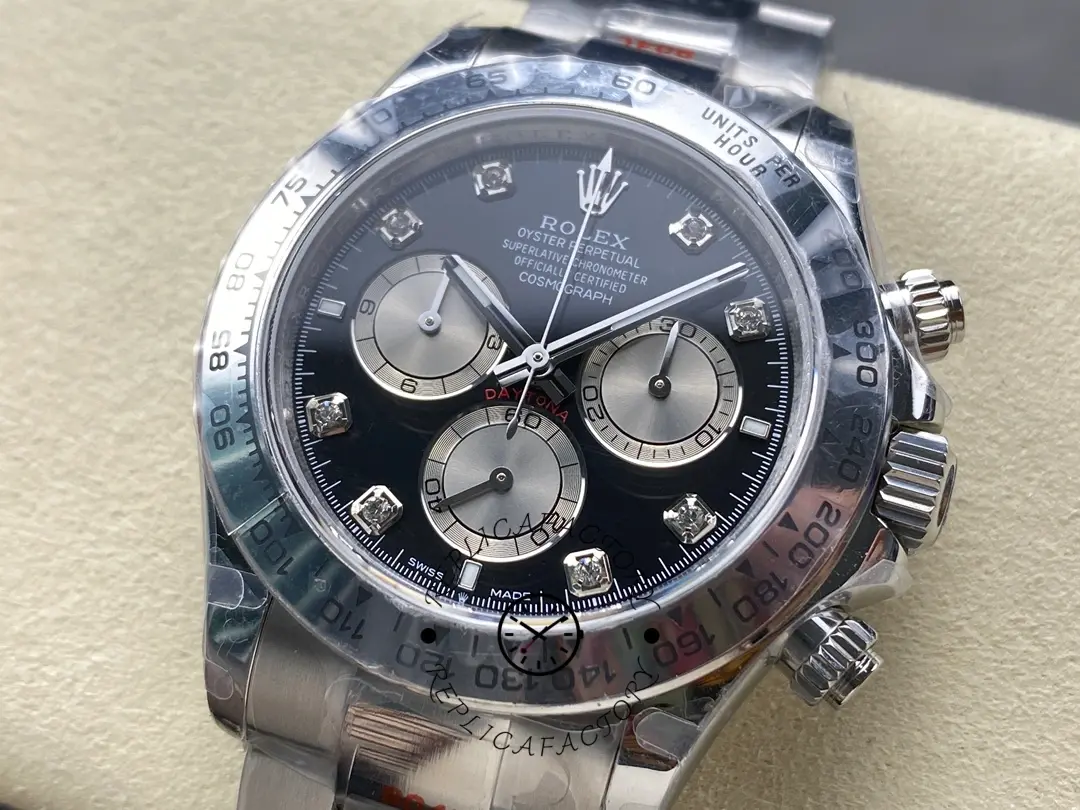 Angled dial close-up of Rolex Cosmograph Daytona 126509-0002 showing bezel edge and pushers.