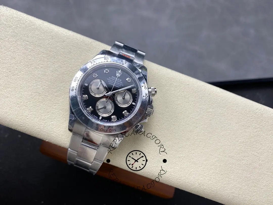 Full watch view of Rolex Cosmograph Daytona 126509-0002 on cushion, steel bracelet and case shine.