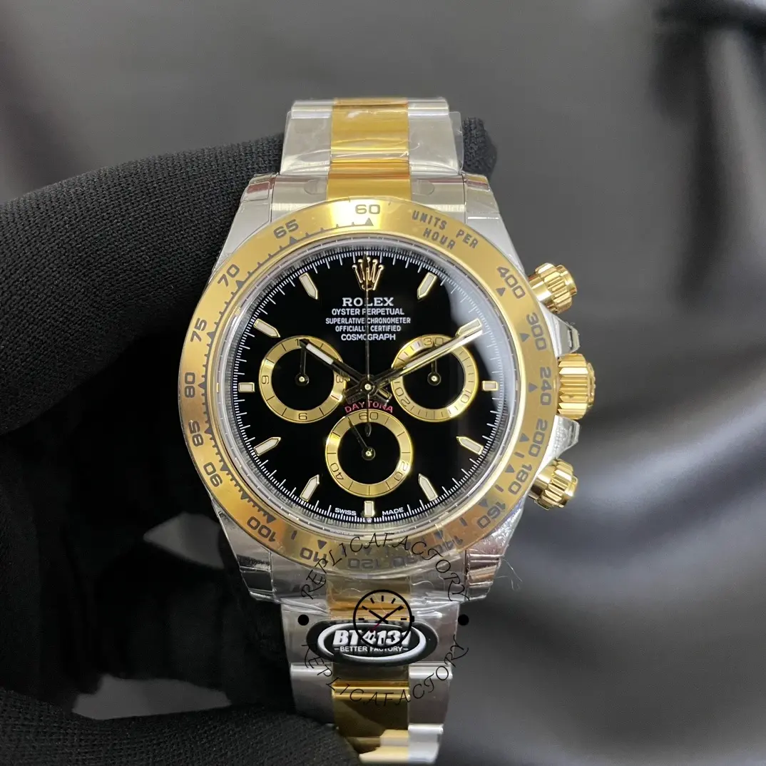 Gloved front view of the Rolex Cosmograph Daytona 126503 0003 showing black dial and gold accents.