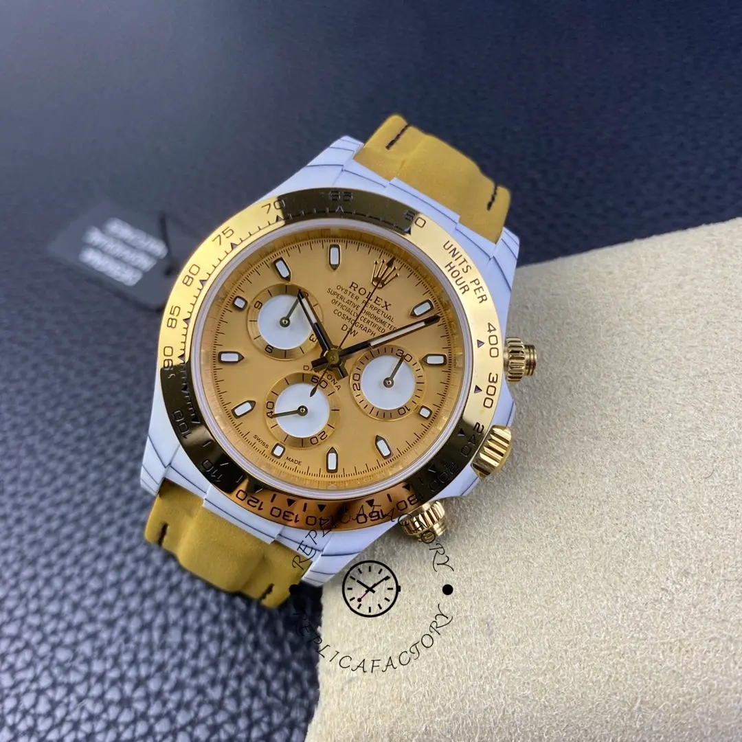 Rolex Daytona DiW Quartz Fiber Luminous 40mm, front view on dark surface, yellow strap.