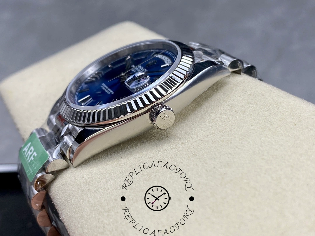 Side view of Rolex Day-Date 228239 showing screw-down crown and case thickness on cushion.