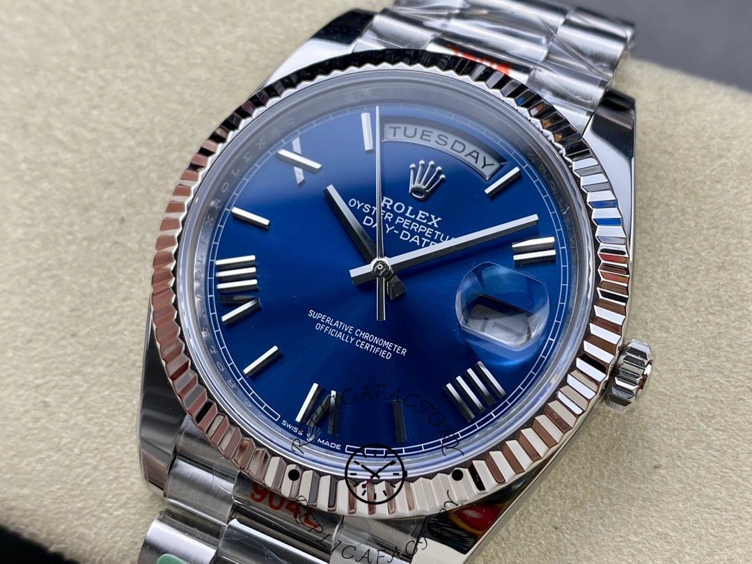 Close-up front view of Rolex Day-Date 228239 with blue dial, day display at 12 and date lens at 3.