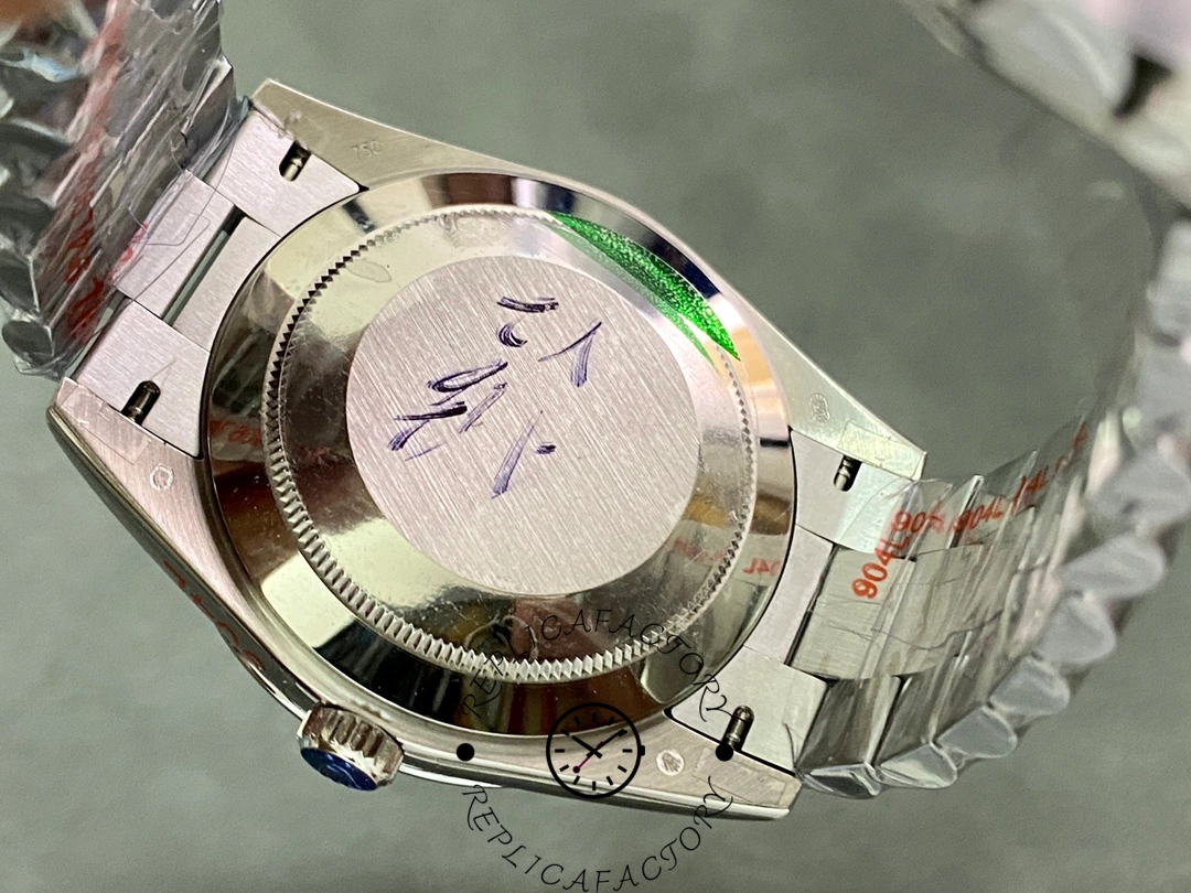 Back view of Rolex Day-Date 228239 showing solid caseback and bracelet end links.