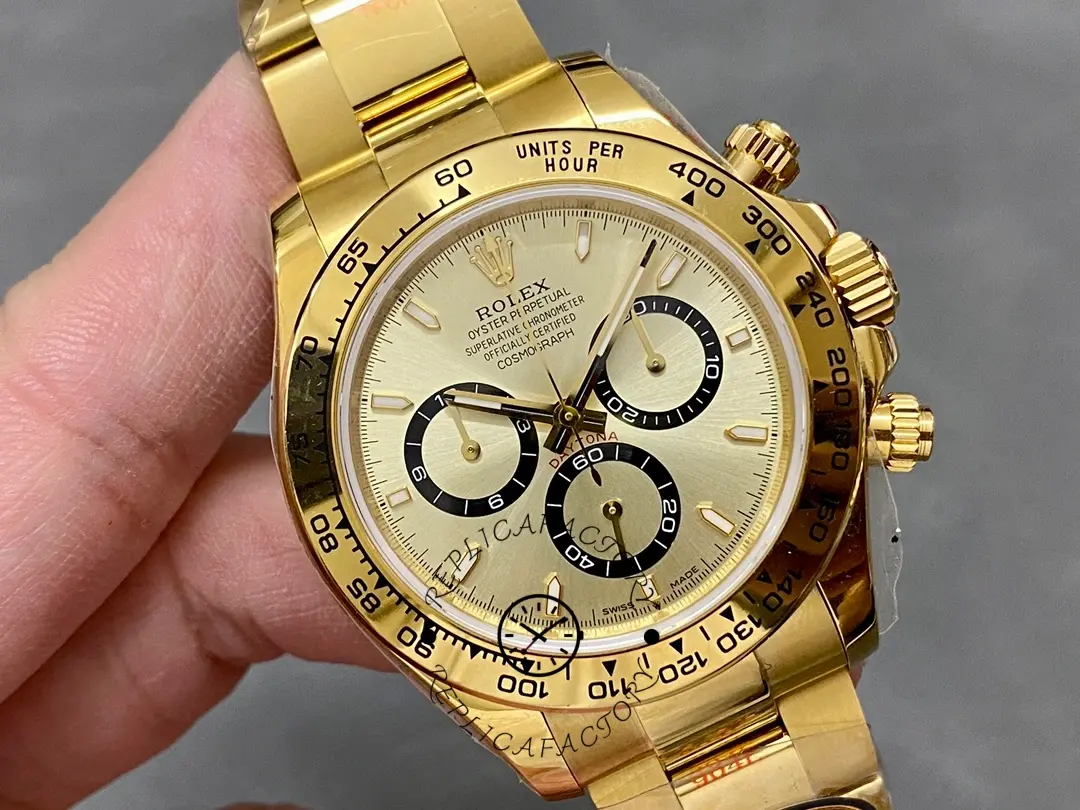 Hand-held close-up of Rolex Cosmograph Daytona 126508 0005 highlighting dial and bezel.