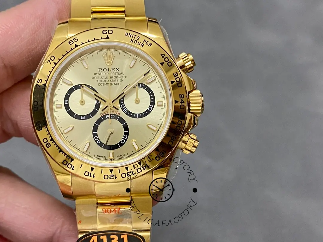 Hand-held front view of Rolex Cosmograph Daytona 126508 0005 showing full gold appearance.
