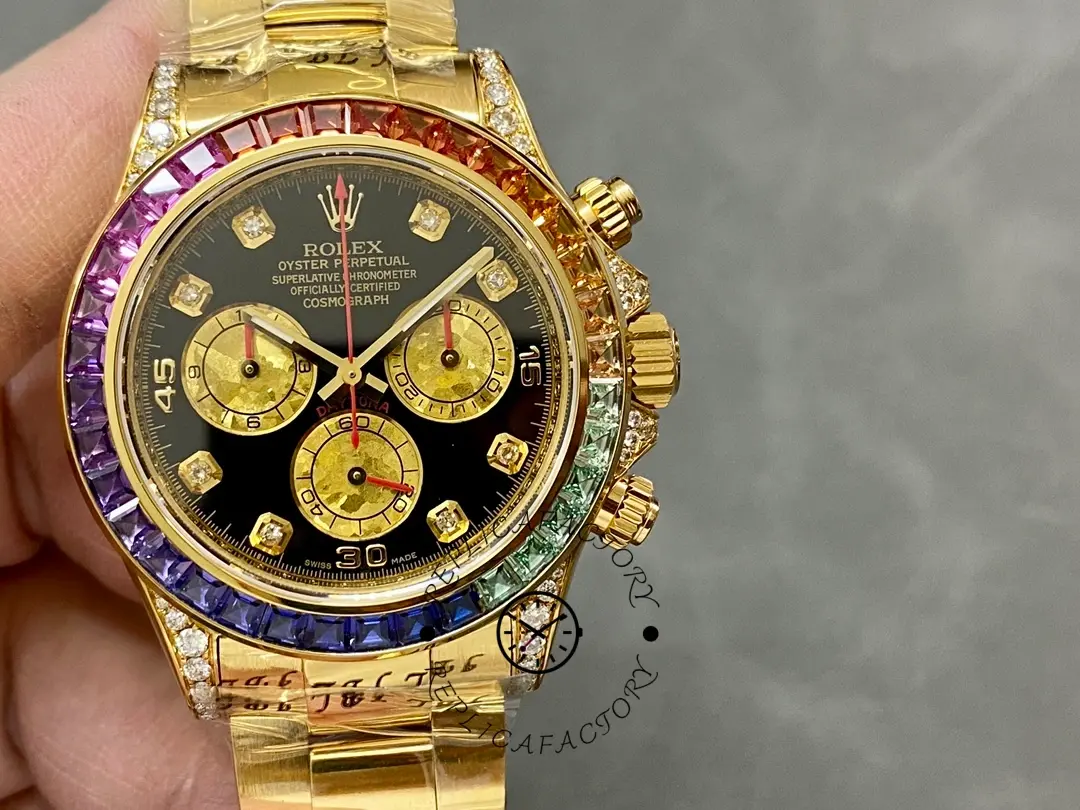 Close hand-held front view of the Rolex Daytona 116598 40MM showing rainbow bezel and black dial.