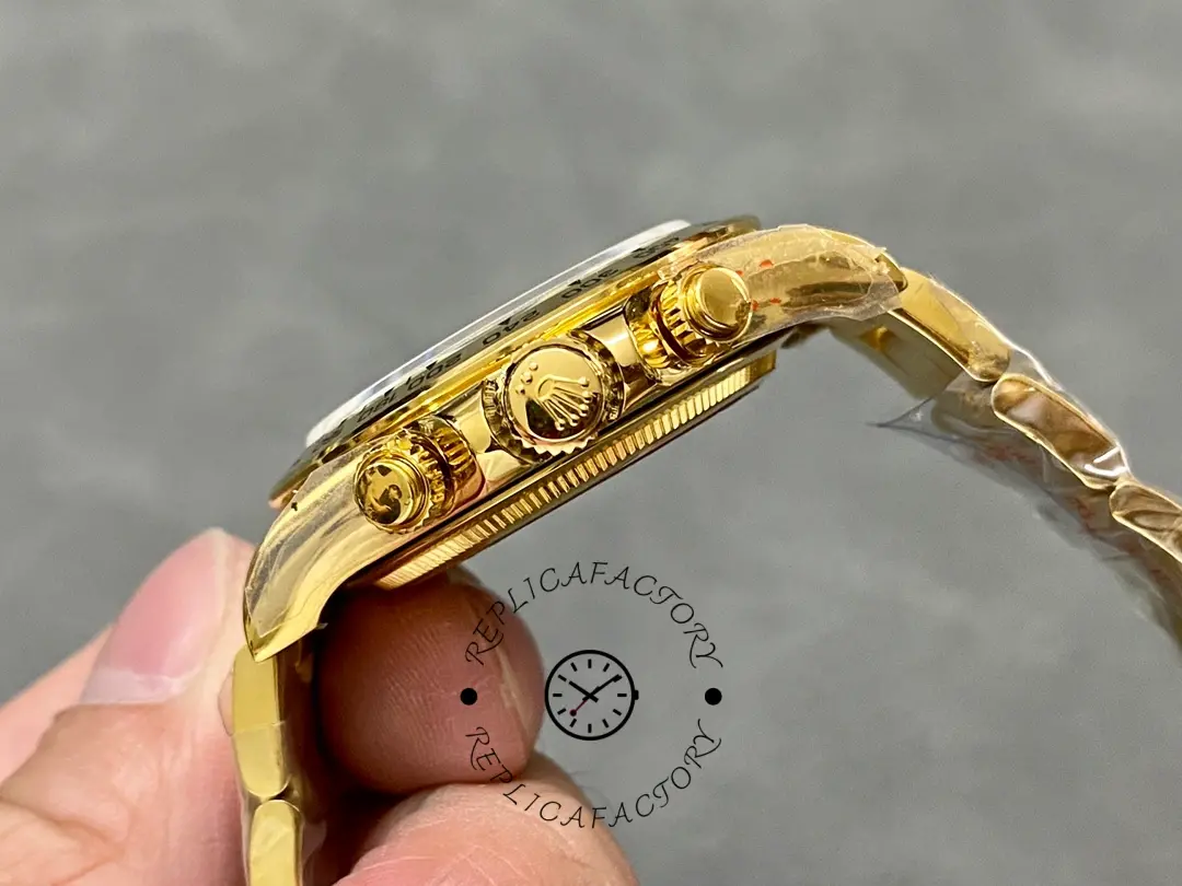 Crown close-up of Rolex Daytona 126508 showing gold crown and chronograph pushers.