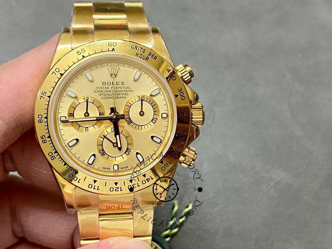 Rolex Daytona 116508 handheld front view, champagne dial and gold bracelet.
