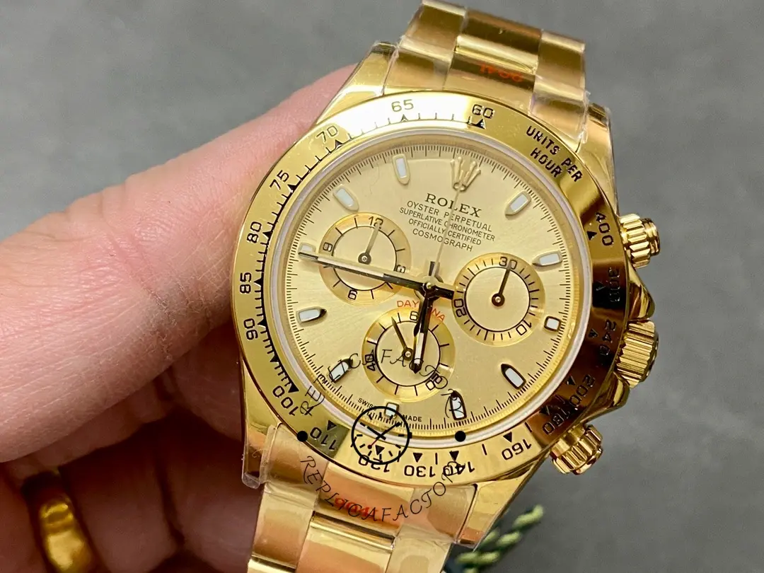 Rolex Daytona 116508 handheld close-up, champagne dial and subdials in focus.