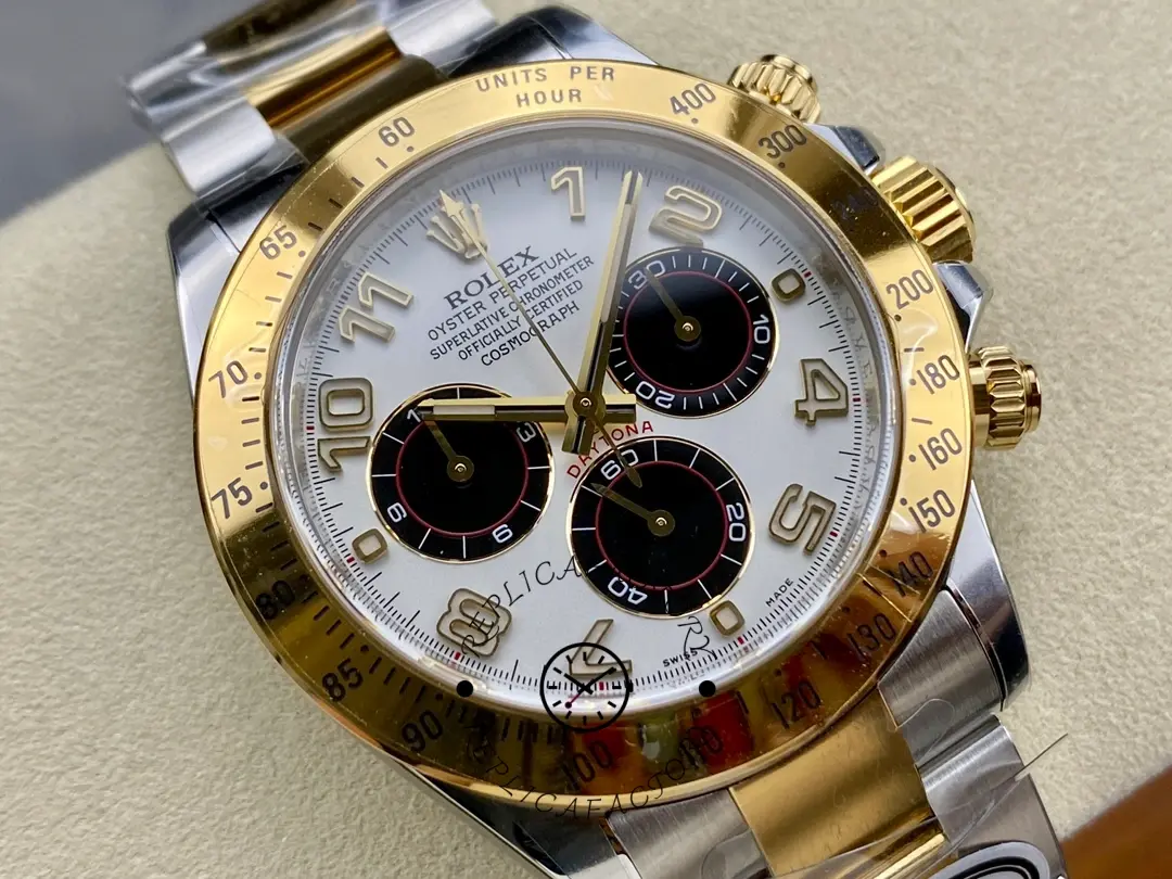 Dial close-up of the Rolex Daytona 116523 40mm showing Arabic numerals and black subdials.