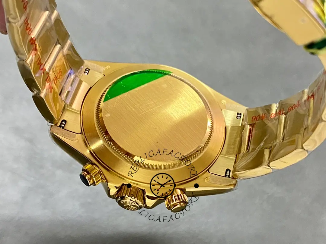 Rolex Daytona 116508 case back close-up, protective sticker and gold finish detail.