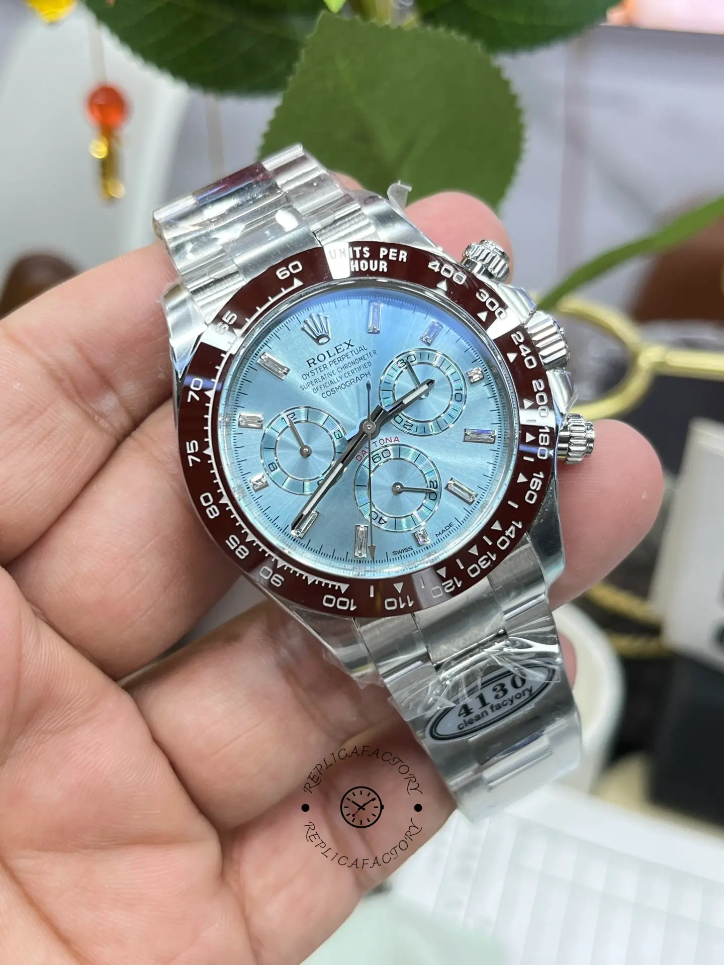 Handheld full view of Rolex Daytona 116506 showing case and bracelet fit.