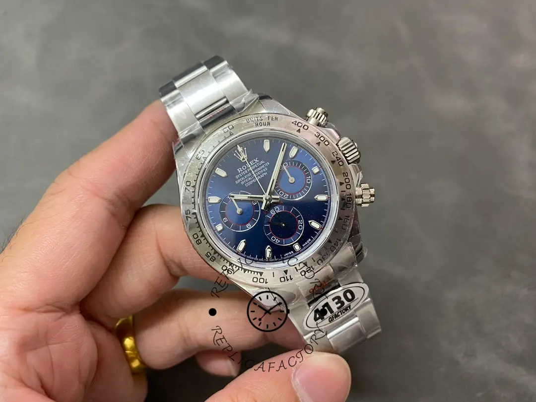 Full watch in-hand view of the Rolex Cosmograph Daytona 116509 40MM showing dial and bracelet.