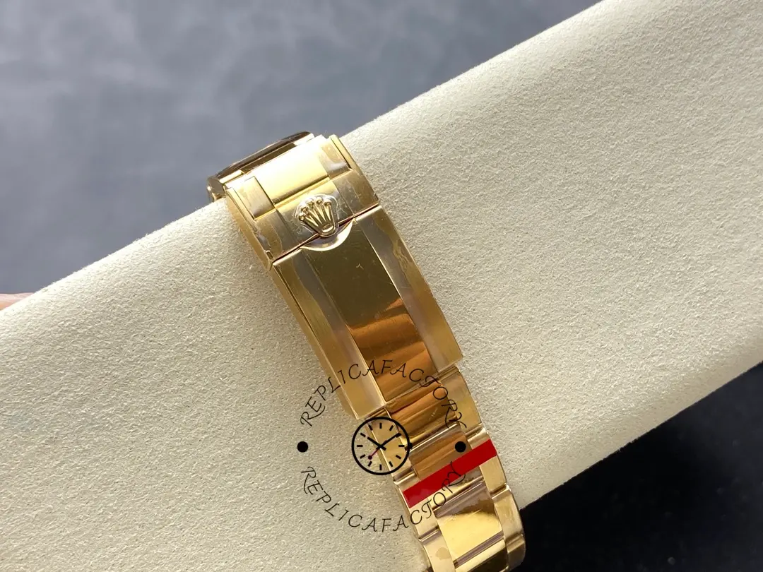 Bracelet clasp detail of Rolex Daytona 116508 on cushion showing clasp underside.