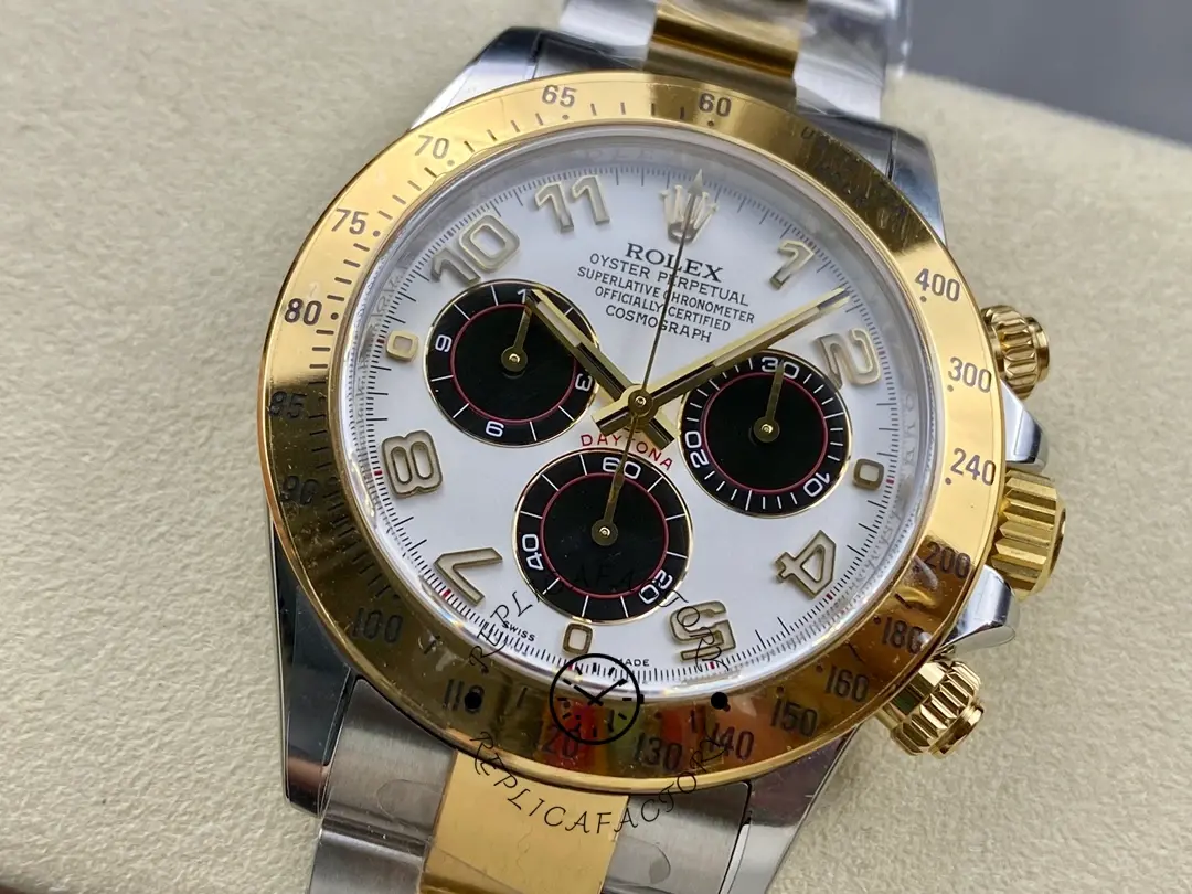 Angled view of the Rolex Daytona 116523 40mm highlighting gold bezel, lugs, and panda dial.