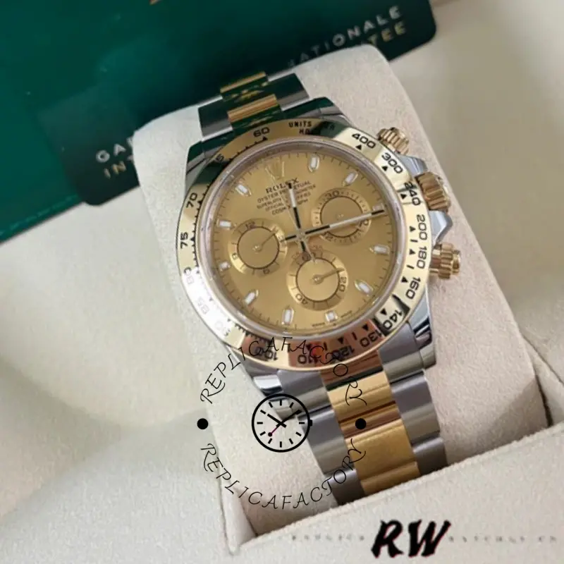Rolex Daytona 116503 on stand, front view with box, champagne dial and two-tone bracelet.