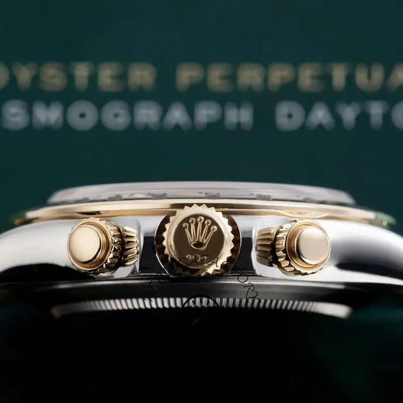 Crown-side close-up of the Rolex Daytona 116523 40mm showing pushers and gold mid-case.