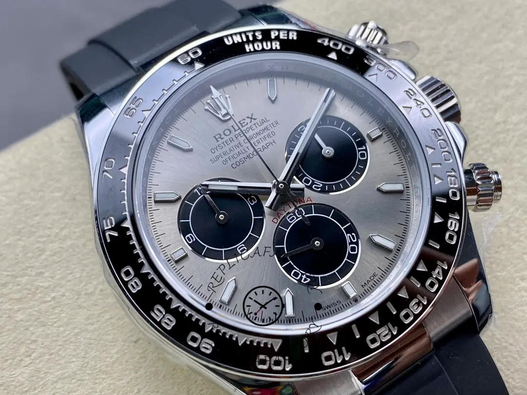 Rolex Daytona 116519 dial macro, grey dial with subdials and bezel scale.