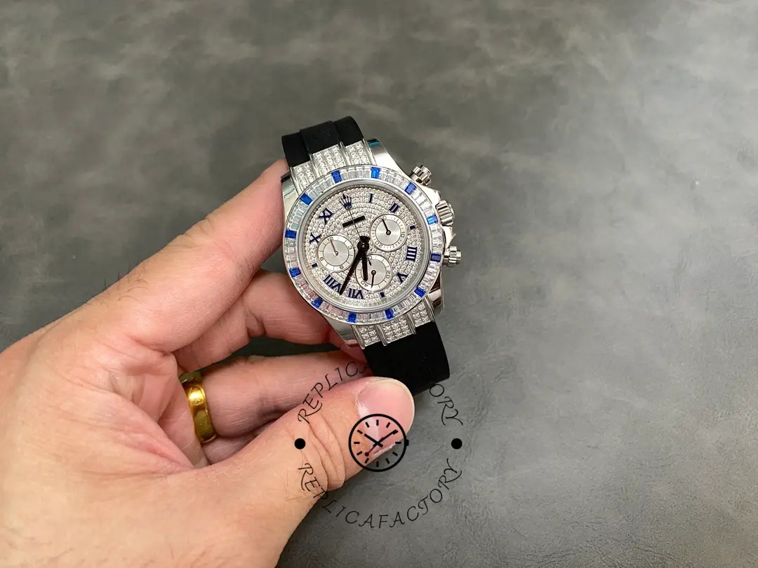 Hand-held full watch view of Rolex Daytona 116599 showing strap and case proportions.