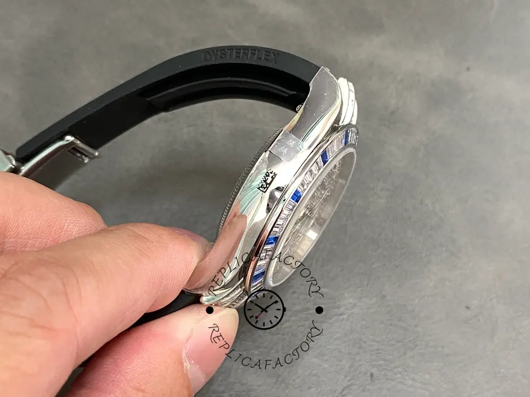 Side profile of Rolex Daytona 116599 showing case thickness and blue strap curve.