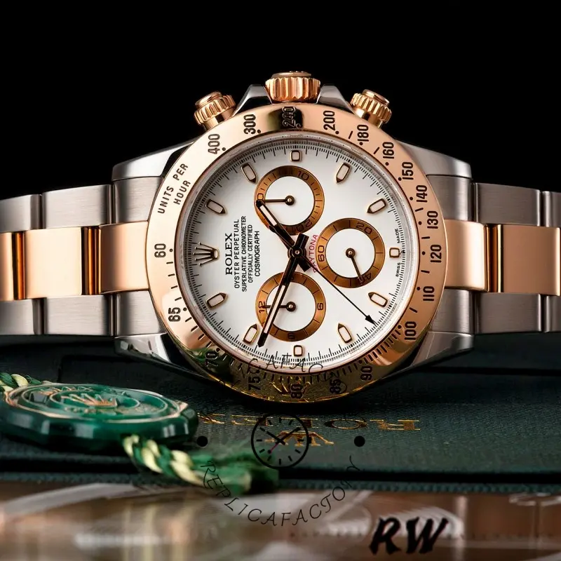 Rolex Daytona 116523 angled view, white dial and gold subdials, two-tone bracelet.