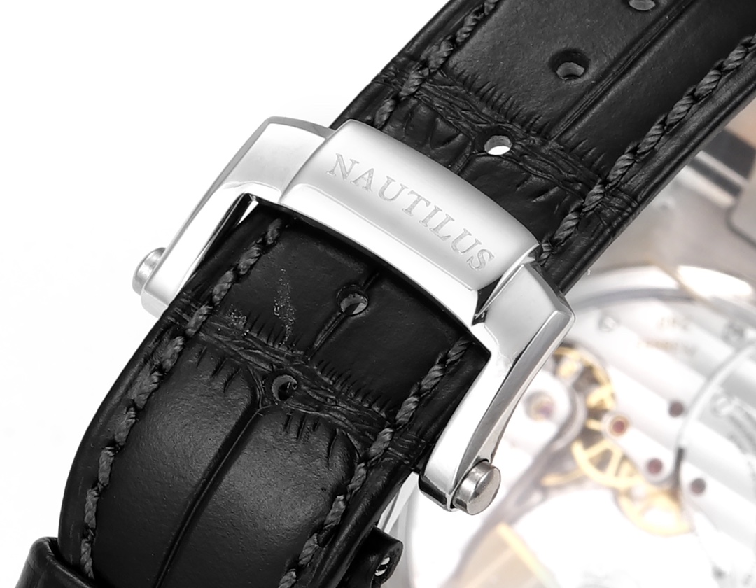 Patek Philippe Nautilus Moon Phases Rose & White Gold Slate Blue Sunburst 5712GR 001