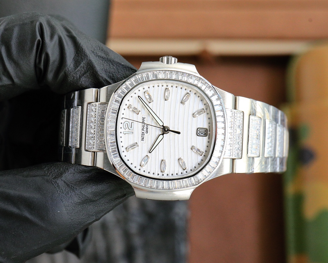Patek Philippe Nautilus Ladies White Gold Diamond Bezel 7118