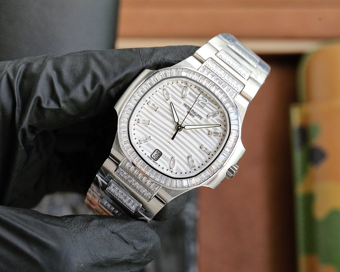 Patek Philippe Nautilus Ladies White Gold Diamond Bezel 7118