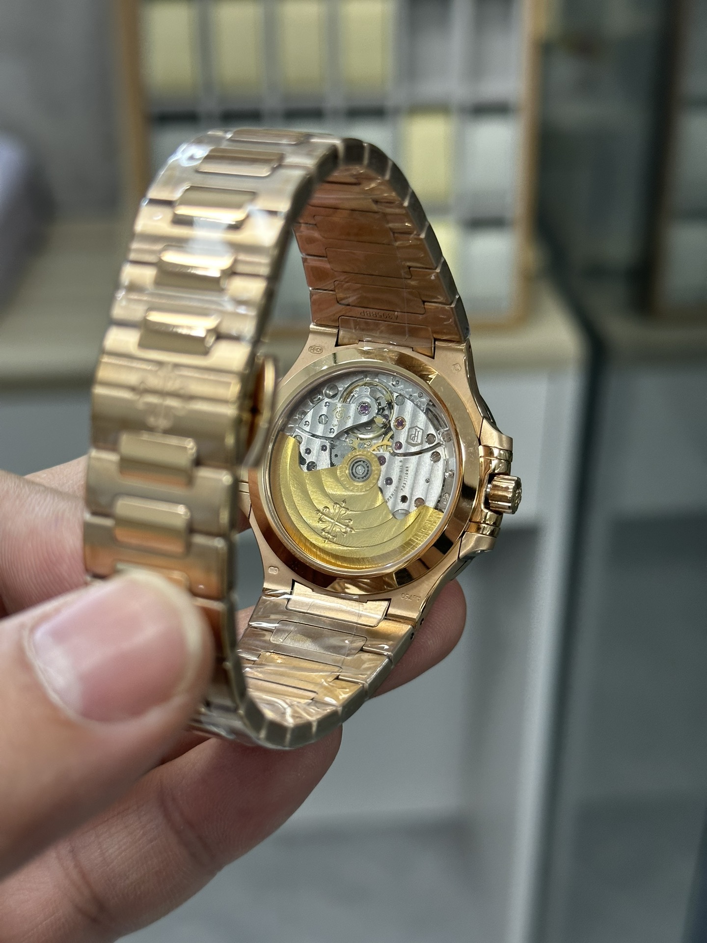 Patek Philippe Ladies Nautilus Golden Dial Rose Gold 7118 1200R 010