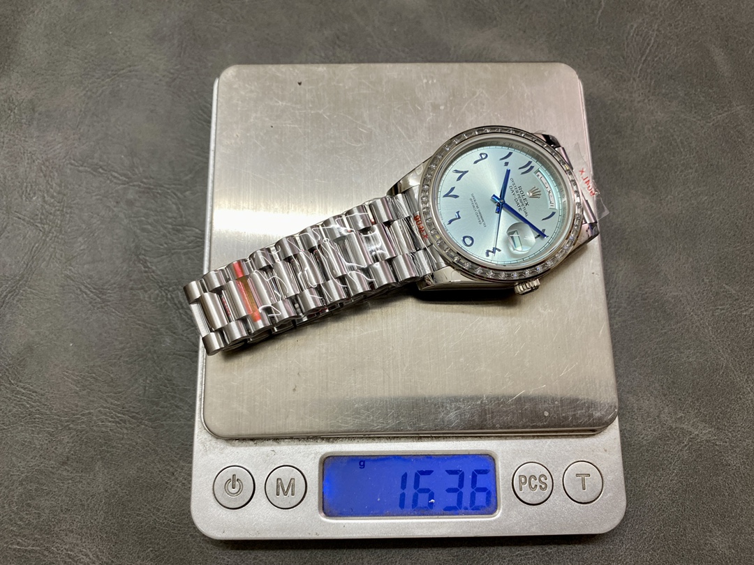 Rolex Day-Date 40mm Platinum Ice Blue Arabic Dial Diamond Bezel 228396TBR Men's Watch