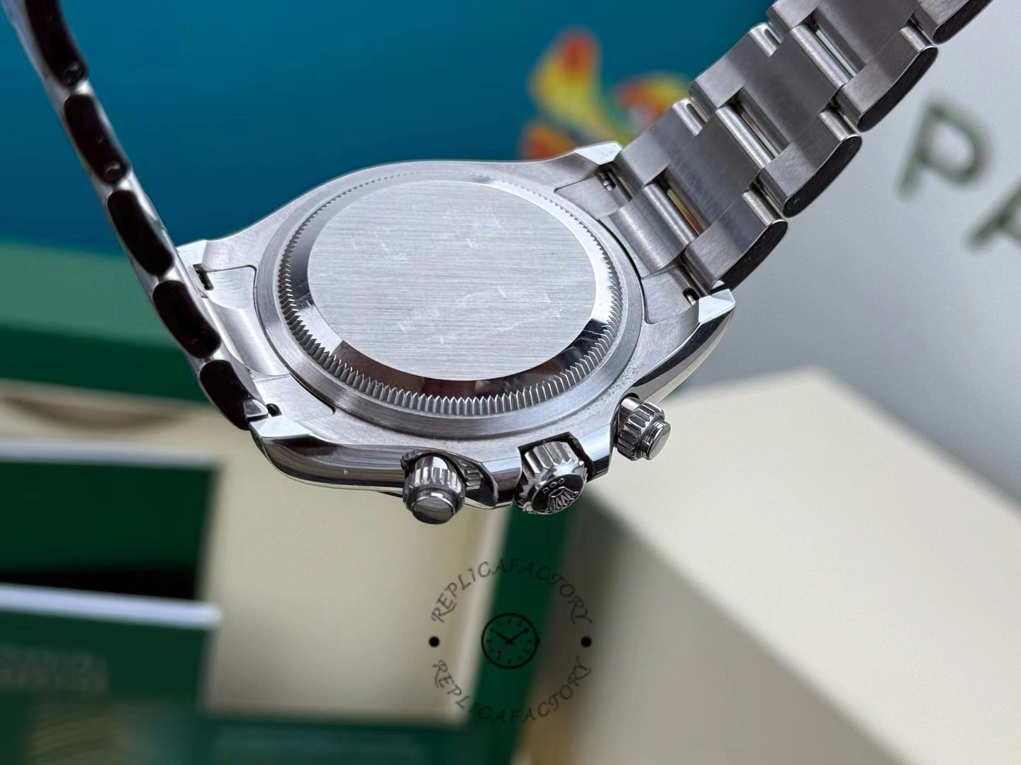 Caseback close-up of Rolex Cosmograph Daytona 116500LN showing brushed finish and screw-down case back