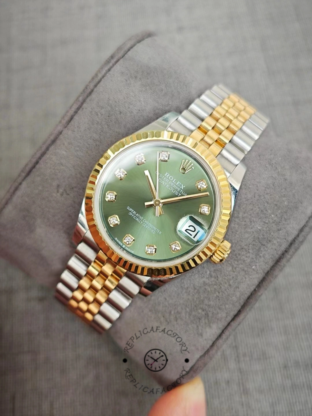 Two-tone Rolex Datejust 31 green dial fluted bezel after 2 years of use